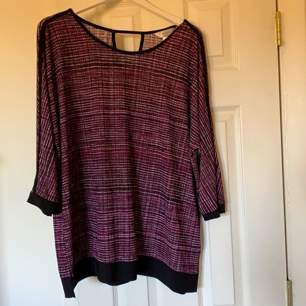 CJ Banks 1X multicolored 3/4 sleeve top with black trim.